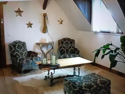 Coin salon dans l'établissement Au cœur des prés
