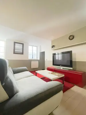 Télévision ou salle de divertissement dans l'établissement Le repos Bressan
