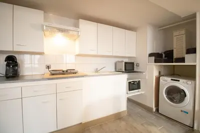 Cuisine ou kitchenette dans l'établissement Le repos Bressan
