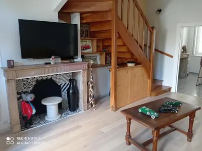 Télévision ou salle de divertissement dans l'établissement Les Pampilles