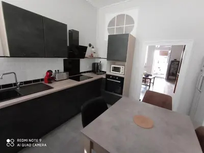 Cuisine ou kitchenette dans l'établissement Les Pampilles