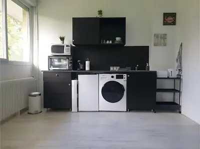 Cuisine ou kitchenette dans l'établissement Appartement Le Classik' PARKING PRIVÉ