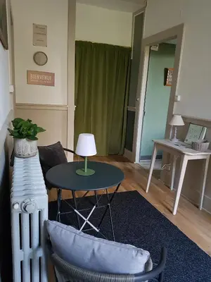 Coin salon dans l'établissement Le Chateau