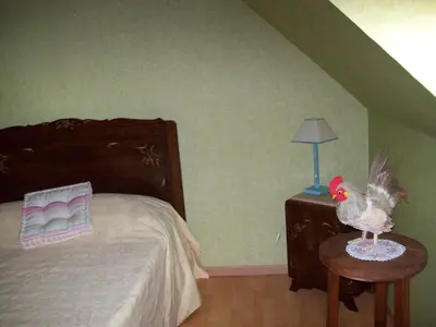 Un ou plusieurs lits dans un hébergement de l'établissement chambre d hotes les jonquilles