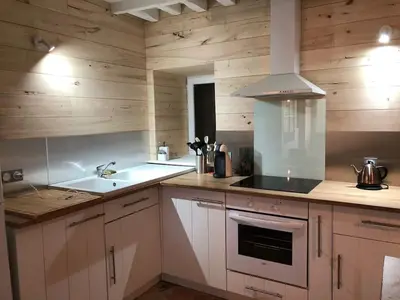 Cuisine ou kitchenette dans l'établissement La Petite Maison