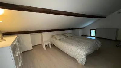 Un ou plusieurs lits dans un hébergement de l'établissement Maison 110 m2 - 3 chambres - 7 couchages - 5 min Dole