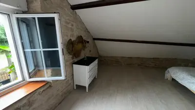 Un ou plusieurs lits dans un hébergement de l'établissement Maison 110 m2 - 3 chambres - 7 couchages - 5 min Dole
