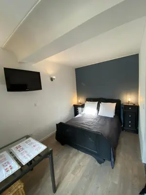 Un ou plusieurs lits dans un hébergement de l'établissement Chambre L Arts de Vivre