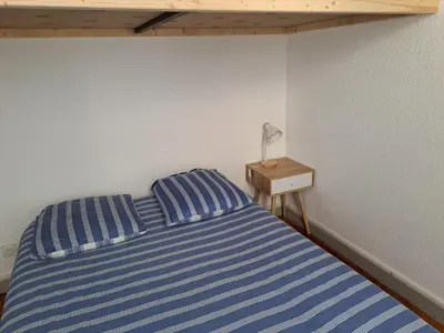 Un ou plusieurs lits dans un hébergement de l'établissement Lons centre T1 rue du commerce