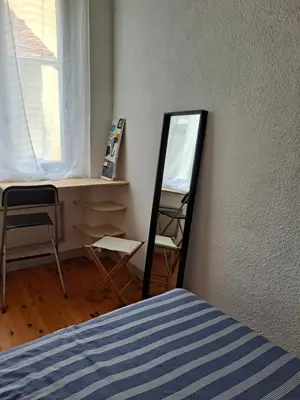 Un ou plusieurs lits dans un hébergement de l'établissement Lons centre T1 rue du commerce