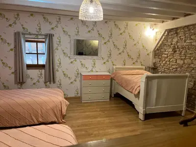 Un ou plusieurs lits dans un hébergement de l'établissement La Grange de Félix