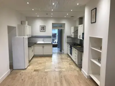 Cuisine ou kitchenette dans l'établissement Logement Montret