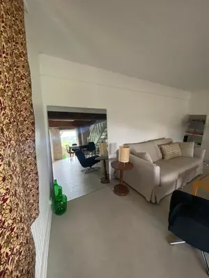 Coin salon dans l'établissement Cottage en vignoble