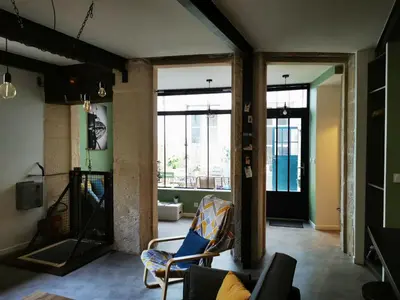 Télévision ou salle de divertissement dans l'établissement Le Cloître Saint-Georges
