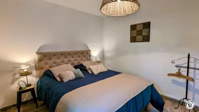 Un ou plusieurs lits dans un hébergement de l'établissement La Maison Bleue