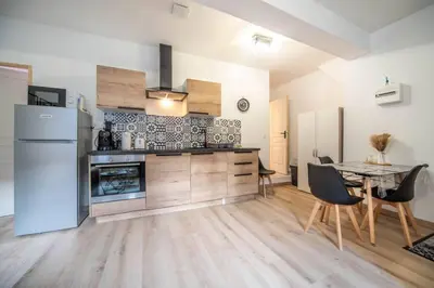 Cuisine ou kitchenette dans l'établissement Lumière aux Fèvres