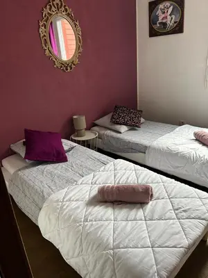 Un ou plusieurs lits dans un hébergement de l'établissement Maison Villa