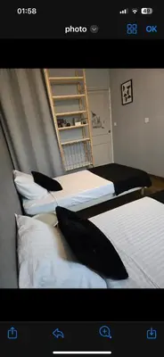 Un ou plusieurs lits dans un hébergement de l'établissement Maison Villa
