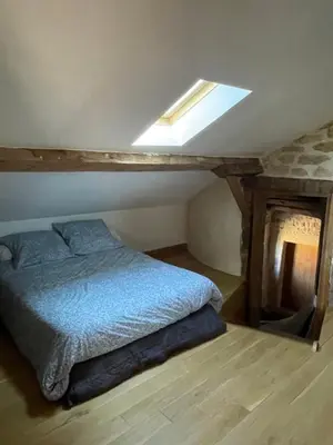 Un ou plusieurs lits dans un hébergement de l'établissement Château de GRANDVAUX