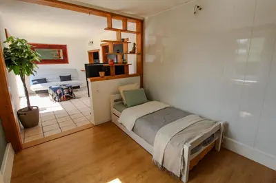 Cuisine ou kitchenette dans l'établissement Charmante Maison avec Terrasse