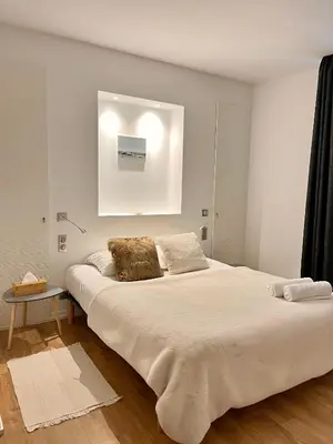 Un ou plusieurs lits dans un hébergement de l'établissement Domaine Paulette, Maison Blanche