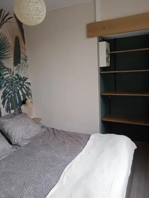 Un ou plusieurs lits dans un hébergement de l'établissement Au petit nid d'Apollon
