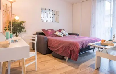 Un ou plusieurs lits dans un hébergement de l'établissement Charmant appartement T1 Mâcon