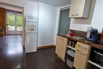 Cuisine ou kitchenette dans l'établissement L'Ain-parfait