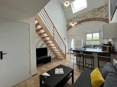 Coin salon dans l'établissement Appartement avec du cachet