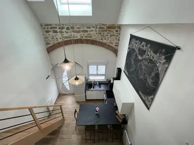Coin salon dans l'établissement Appartement avec du cachet