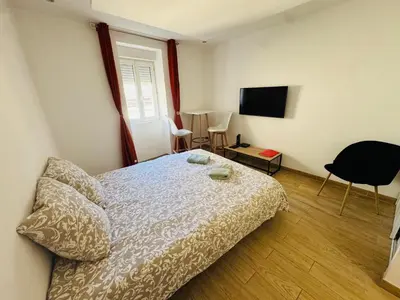 Télévision ou salle de divertissement dans l'établissement Superbe appartement beaune centre