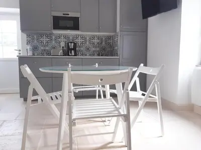 Cuisine ou kitchenette dans l'établissement Charmant gîte Au saut des vignes