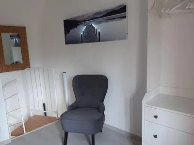Télévision ou salle de divertissement dans l'établissement Charmant gîte Au saut des vignes