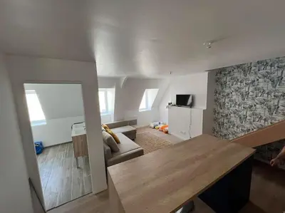 Coin salon dans l'établissement Chez TH'Auxonne