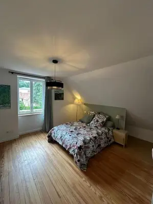 Un ou plusieurs lits dans un hébergement de l'établissement maison en ville Karine et Flavie