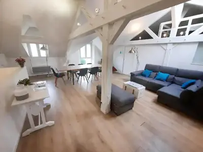 Coin salon dans l'établissement Legrand - 90m2, 6 Prs, 3 Ch, Proche Gare