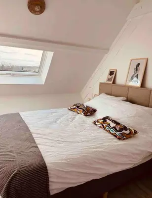 Un ou plusieurs lits dans un hébergement de l'établissement Maison à la campagne
