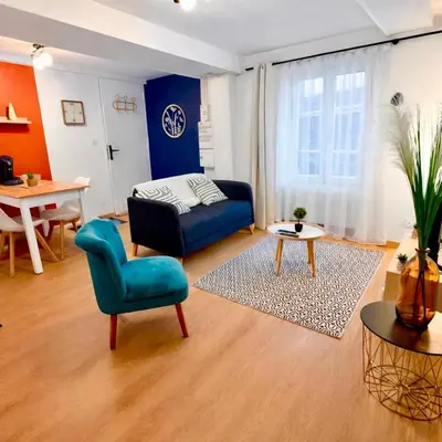 Coin salon dans l'établissement Centre Dole - Appartement Cosy- Parking Gratuit à Proximité