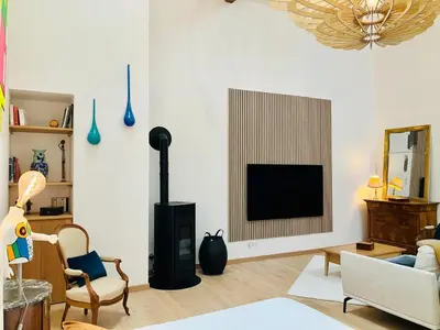 Télévision ou salle de divertissement dans l'établissement Studio Clos des Renauds