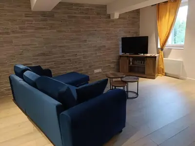 Télévision ou salle de divertissement dans l'établissement gîte des marguerites
