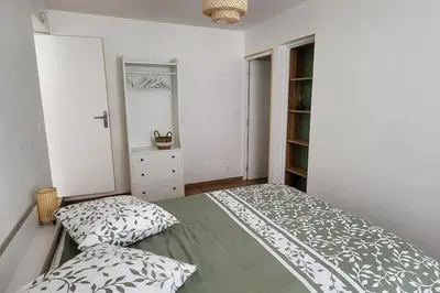 Un ou plusieurs lits dans un hébergement de l'établissement Appartement 2 pièces Le Louveteau