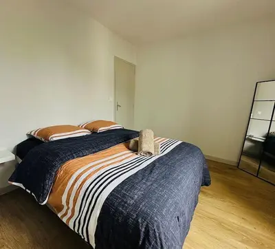 Un ou plusieurs lits dans un hébergement de l'établissement Loco Parc Duplex