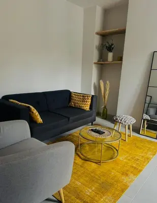 Coin salon dans l'établissement Loco Parc Duplex