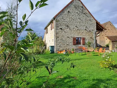 Jardin de l'établissement Charmante maison de caractère