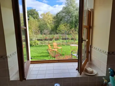 Jardin de l'établissement Charmante maison de caractère