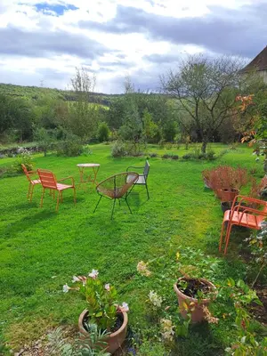 Jardin de l'établissement Charmante maison de caractère