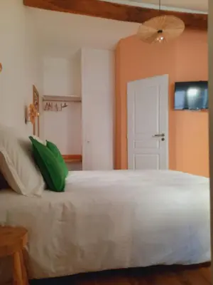 Un ou plusieurs lits dans un hébergement de l'établissement Maison Rinette