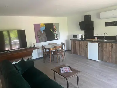 Cuisine ou kitchenette dans l'établissement Harmonie Chalain Appartements