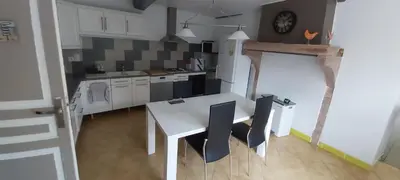 Cuisine ou kitchenette dans l'établissement Le gîte 