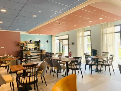 Restaurant ou autre lieu de restauration dans l'établissement DOMITYS - Le Bouquet